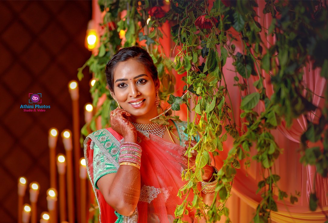 A stunning bride in a sari, captured by Athini Photos Coimbatore, at Balaji & Priya's wedding.