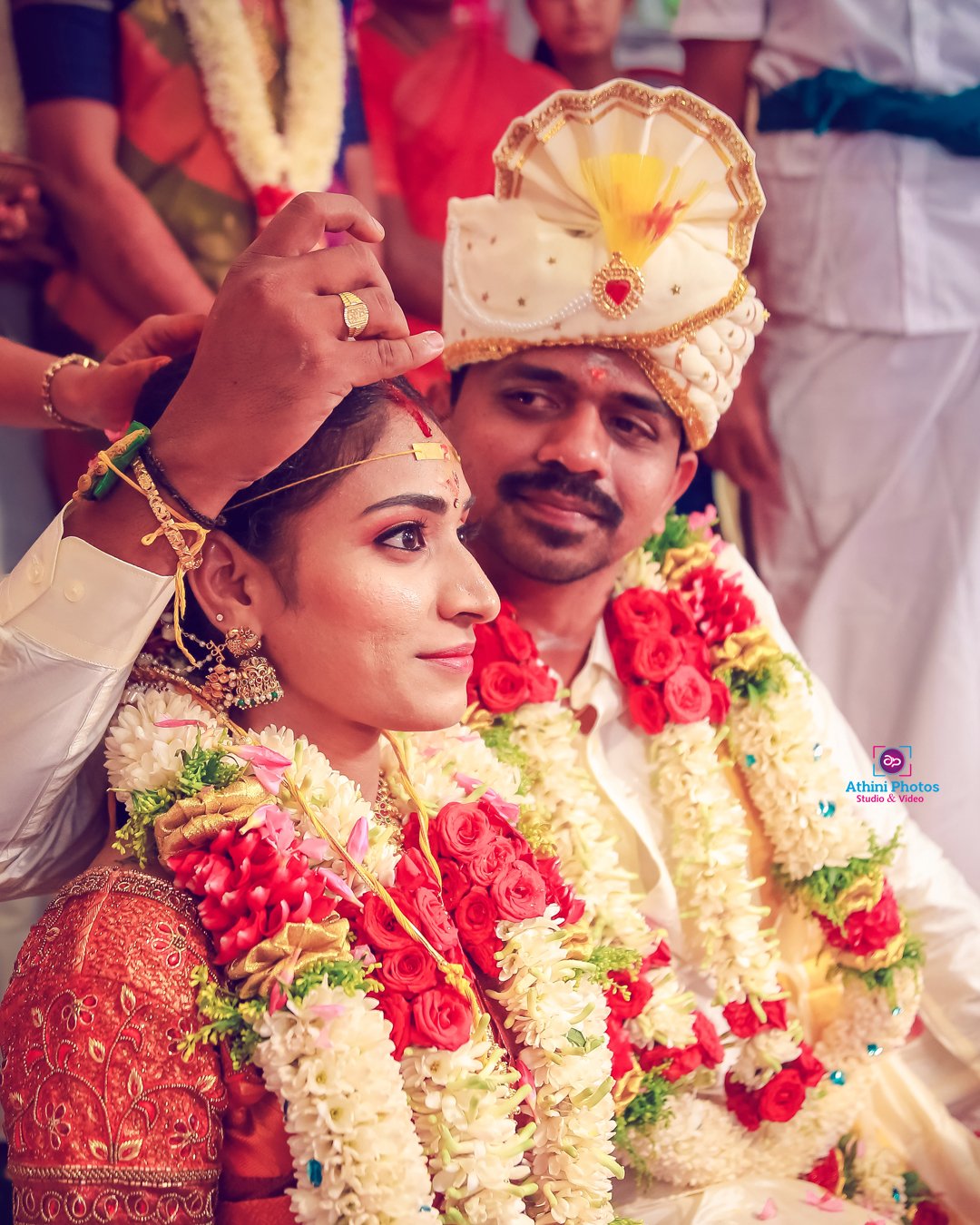 Wedding photographer capturing beautiful moments during a photoshoot in Tamilnadu.