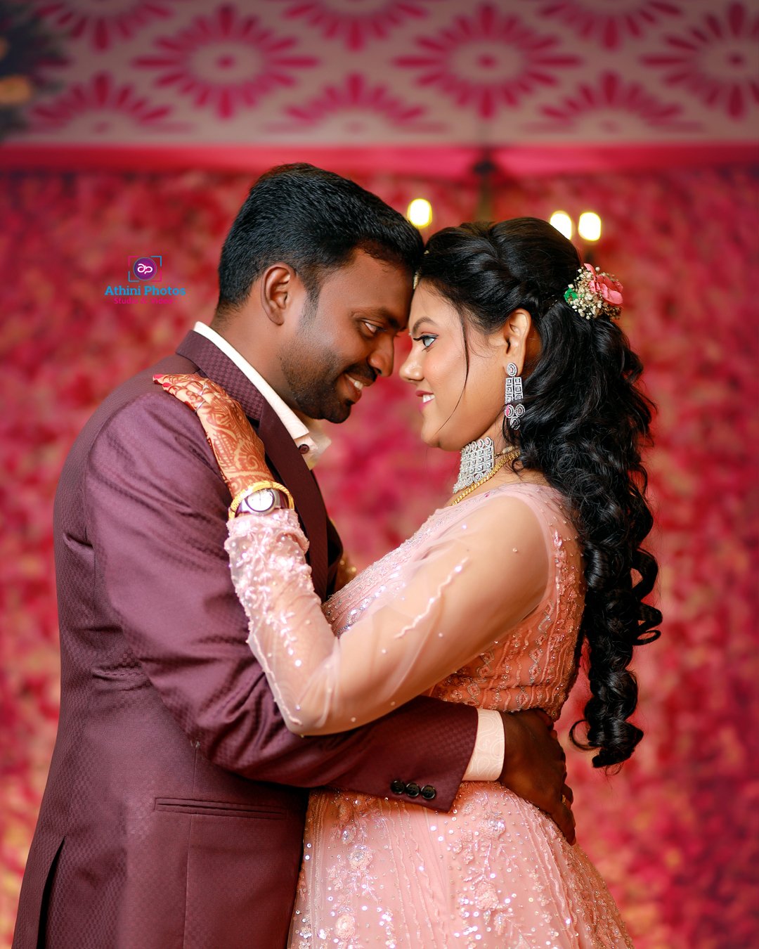 Wedding photographer in Hyderabad capturing a beautiful moment between a bride and groom.