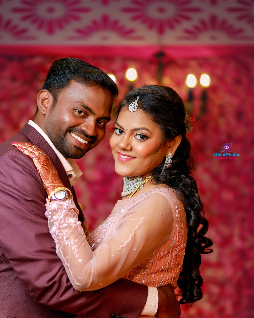 Wedding photographer in Hyderabad capturing a beautiful moment between a bride and groom.