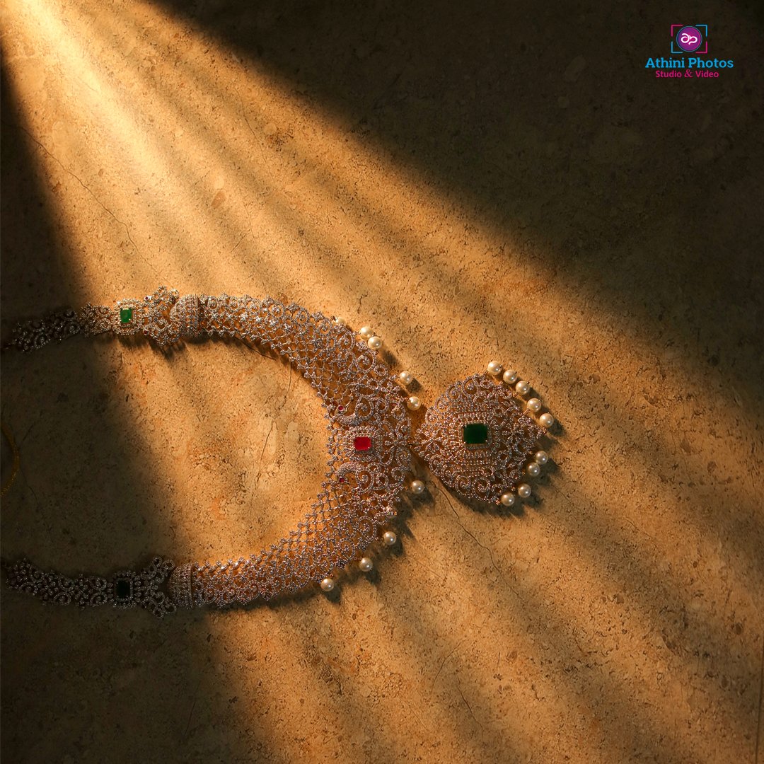 Necklace with sun shining through, perfect for wedding photoshoot.