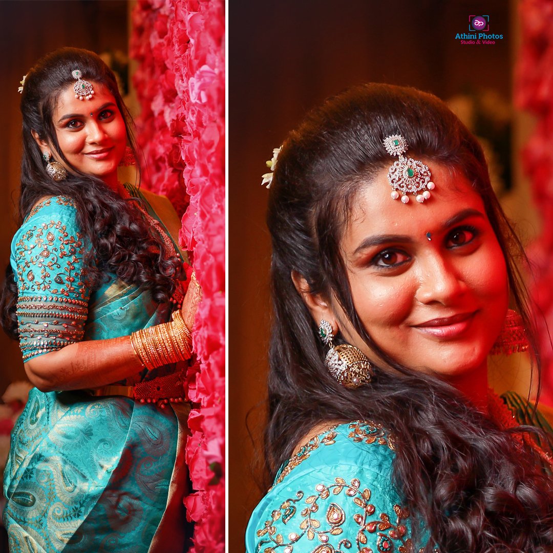 Indian bride looking radiant in blue sari for her wedding photoshoot.