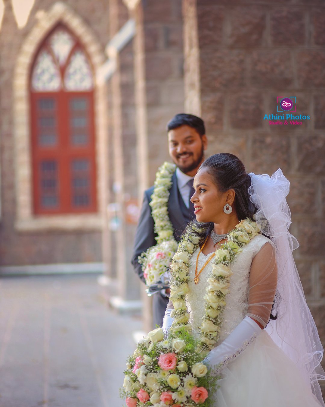 Wedding photographer capturing beautiful moments at a Christian wedding in Chennai.